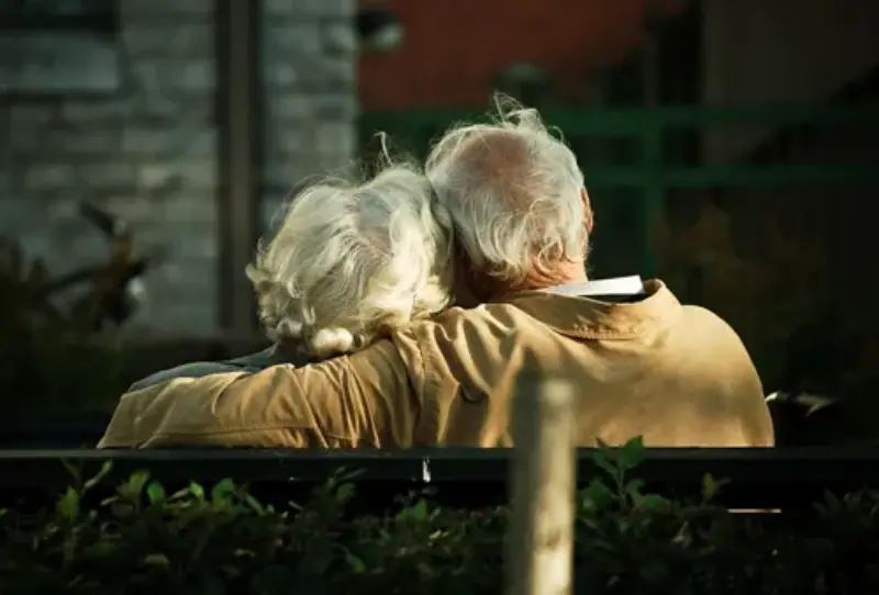 Elderly couple reflecting on life